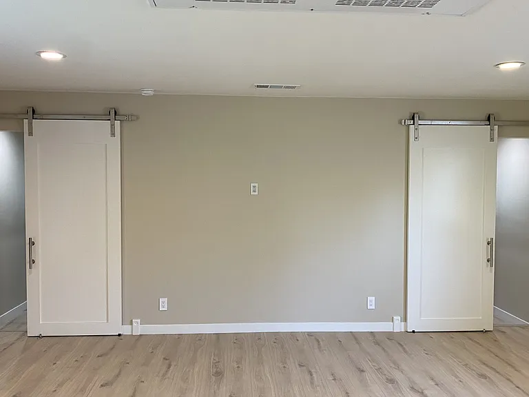 Main area to Bedrooms / matching Carriage doors / Recessed clock outlet on wall for TV