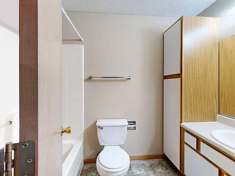 Well-designed bathrooms with added cabinet storage keep daily routines organized and essentials neatly tucked away.