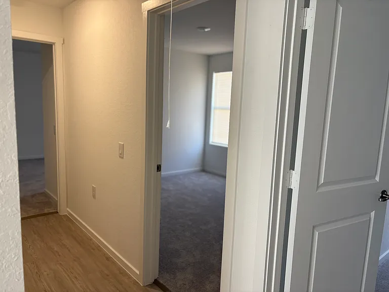 3 Bedrooms. Two on right and one one left in this pic.