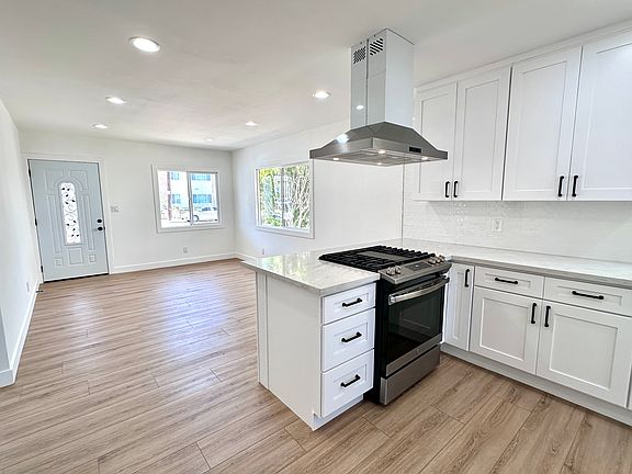 Kitchen & view of living room