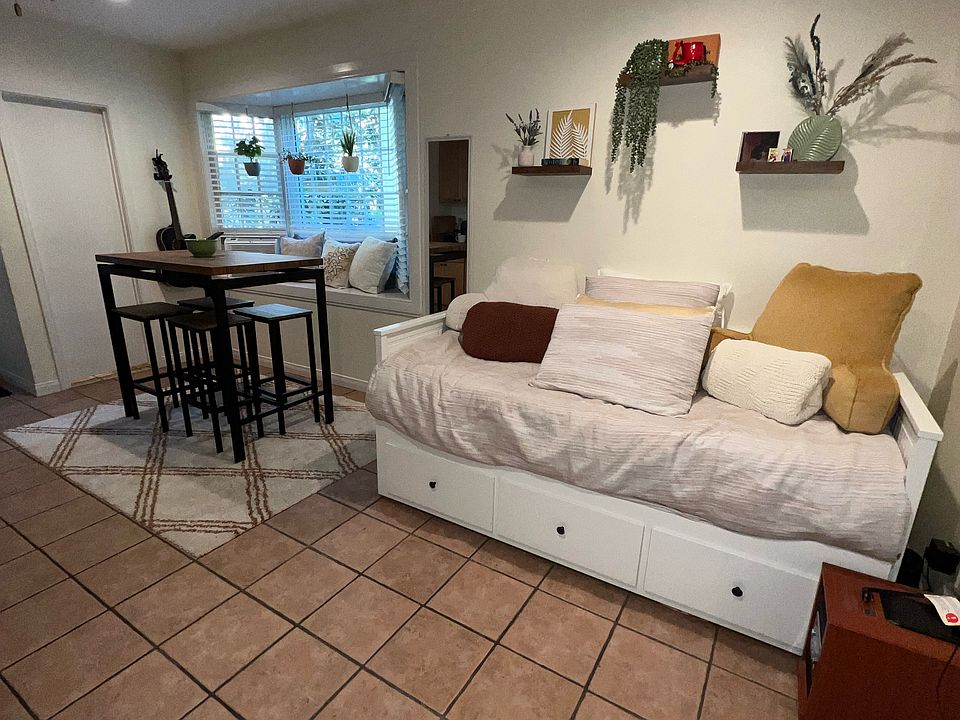 Studio shown with existing tenant's furnishings.