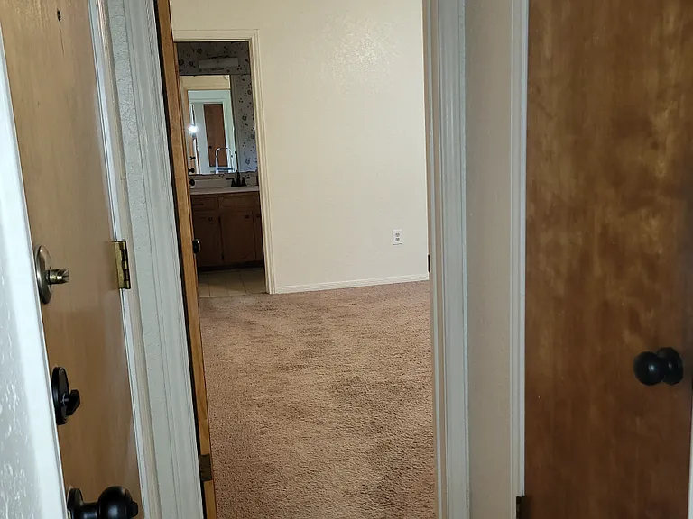 Hallway view of entering Master bedroom