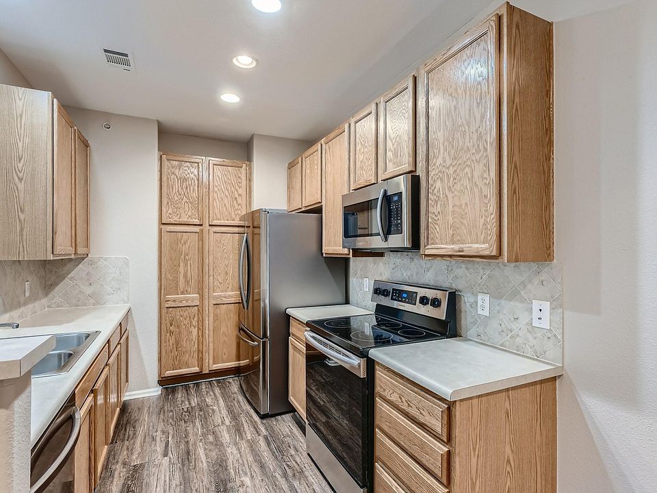 Kitchen with brand new French style Refrigerator