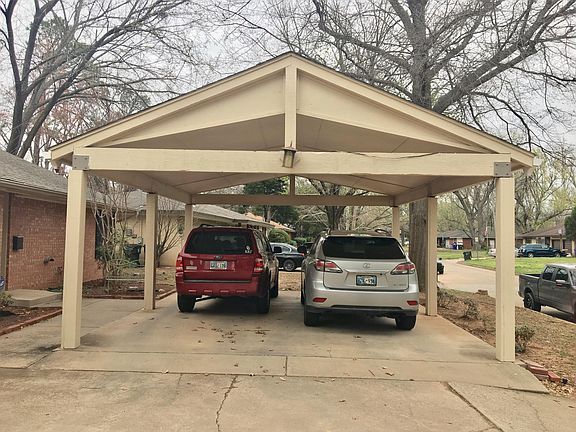 Covered front pavilion offers covered parking (yay! No hail damage or getting wet) or the perfect spot for tailgating parties!