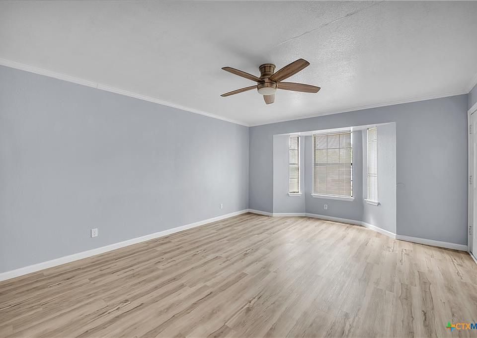 Plenty of natural lighting in the living room.