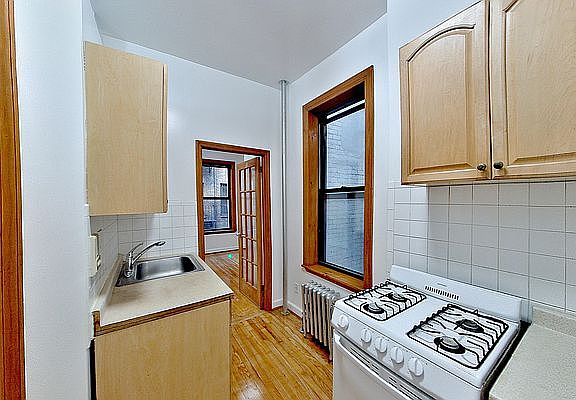 3rd image of 306 E 11th St APT 3D