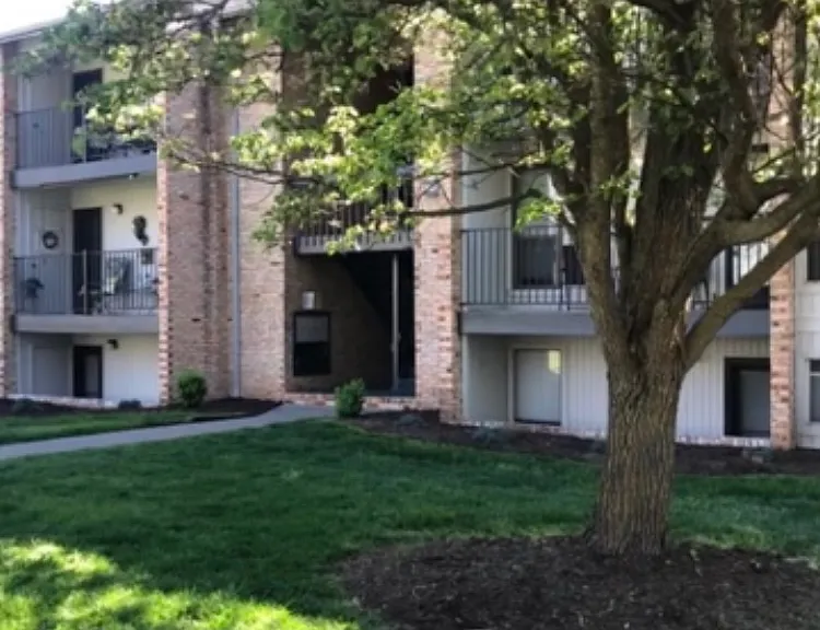 Beautifully maintained community with mature trees and green space