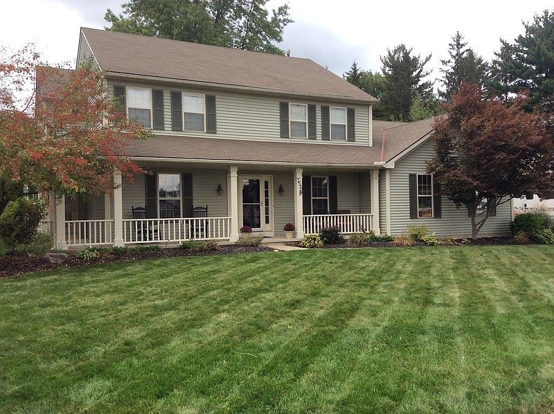 Front view
						:
						Wrap around porch