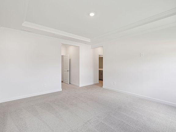 The primary bedroom conveniently leads to your own personal ensuite.