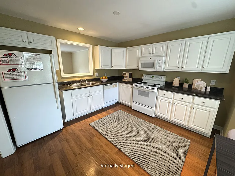 SOUTH HAMPTON VILLAGE — Photo 24