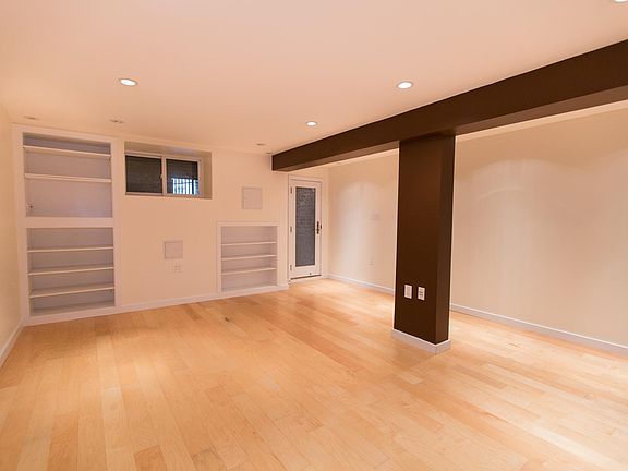 Living room with in-built shelves