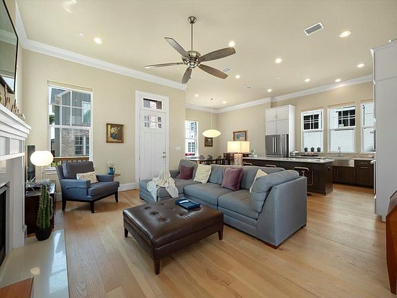 Open-Concept Living Spaces, 12-foot high ceilings, Ceiling Fan, lots of Windows and Natural Light