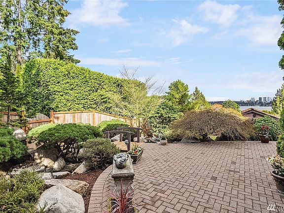 Brick Entry Patio and Japanese Style Garden with Ponds and Waterfalls, Bellevue Skyline Behind