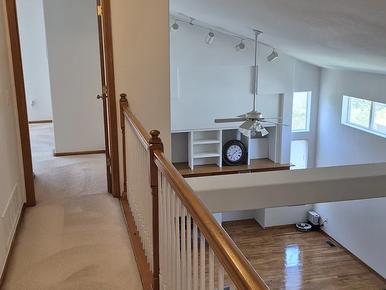 Upper level has three bedrooms and two bathrooms