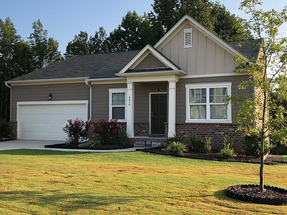Front view w/ rose bushes