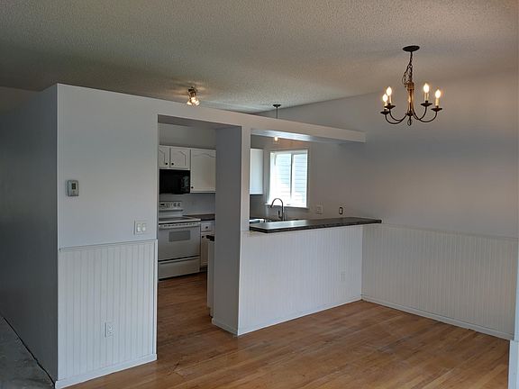 Open layout from kitchen to dining.
