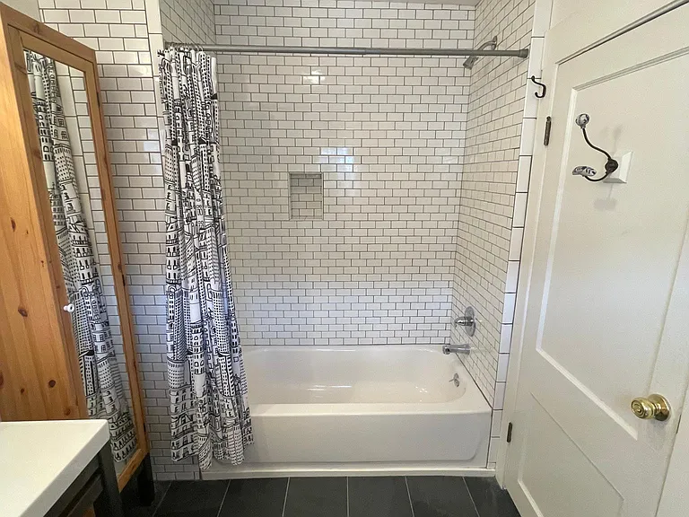 fully tiled bath + shower