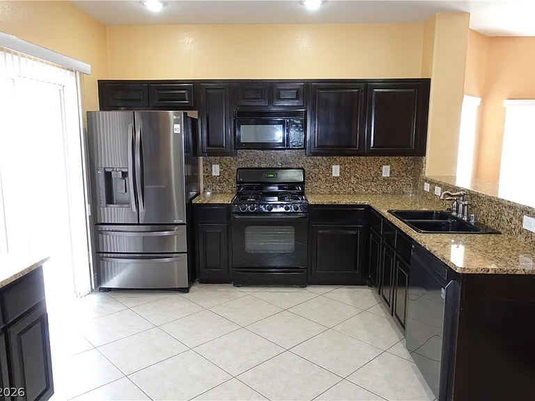 9151 Sunken Meadow Ave — Photo 3