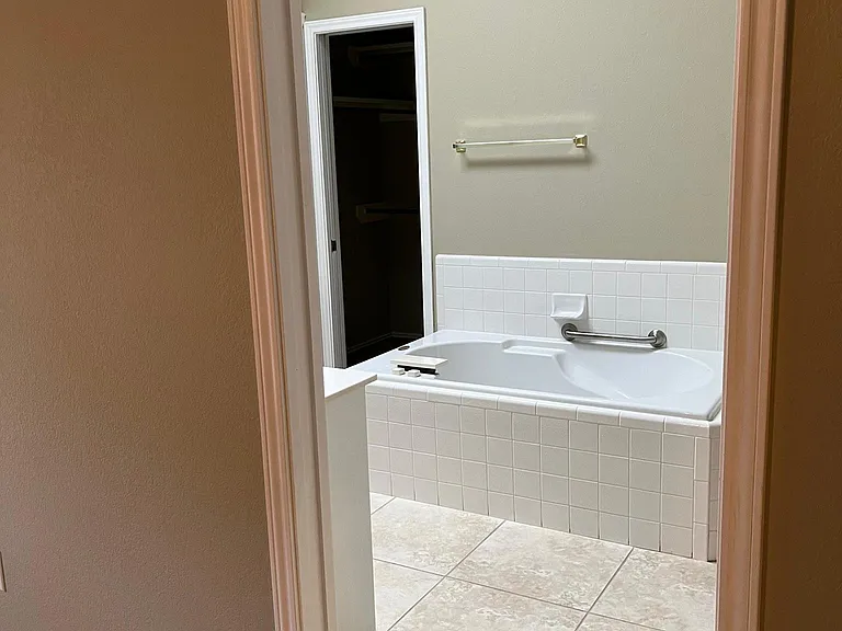 View of tub in master bathroom