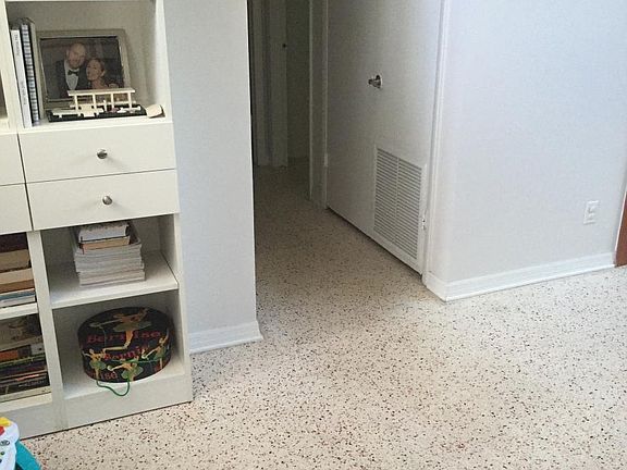 Hallway to the 2nd, 3rd bedrooms, and bathroom