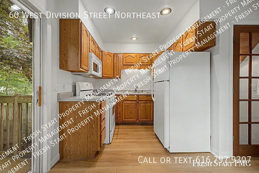 Charming 2-Bedroom Retreat in Rockford Cozy Living at 60 West Division Street! — Photo 2
