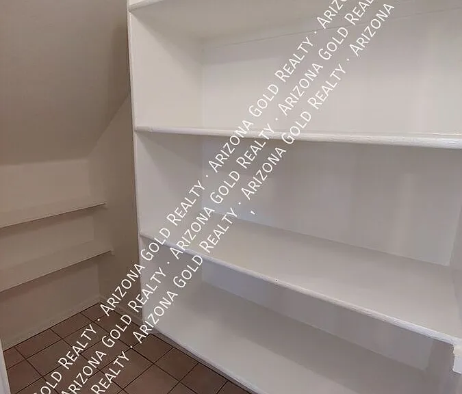 604 E Los Arboles Pl — Photo 11