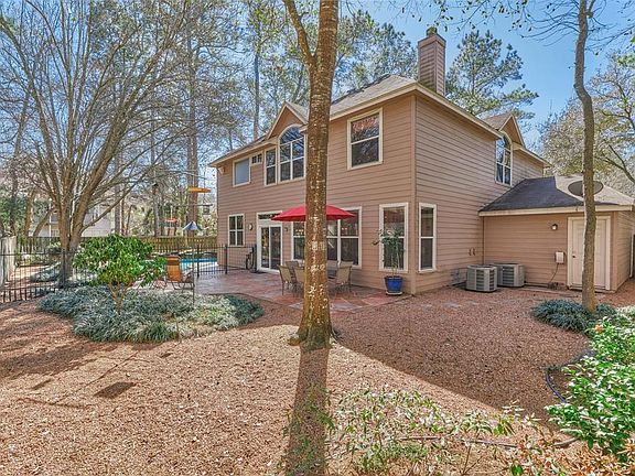 The home is situated on an oversized lot with a low maintenance yard! The yard is separated from the pool area with a wrought iron fence. Lots of privacy and a tranquil setting!