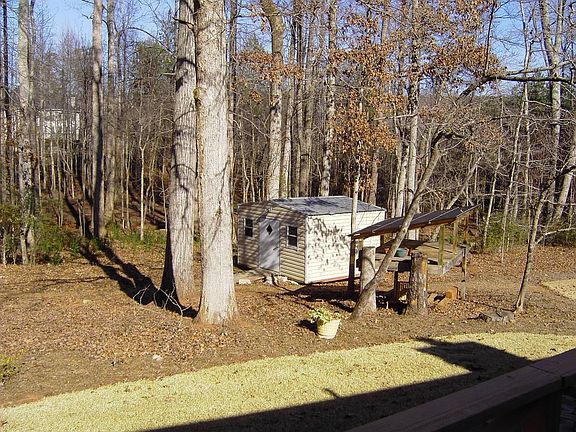 Brand New Work Shed in Backyard has Security Lights and Ramp for easy access. 