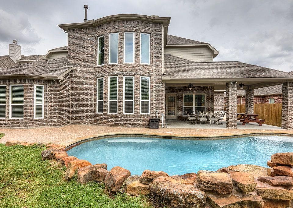 Stunning Auburn Lakes home features a backyard oasis with pool and spa! A perfect place to call home!