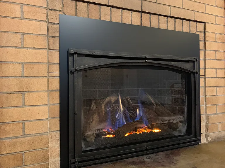 Gas fireplace with fan and remote control