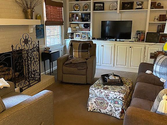 Comfortable den, gas fireplace