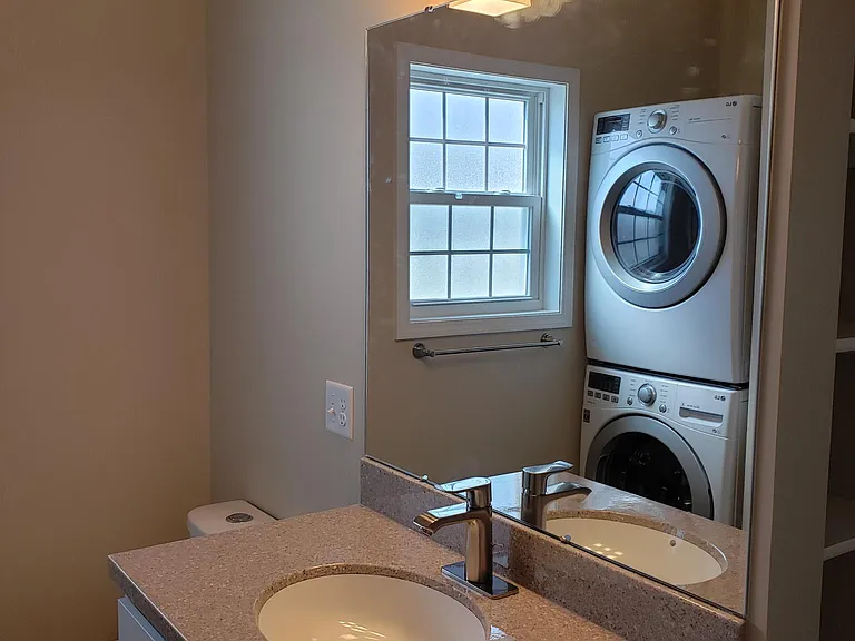 Bathroom sink. Quality countertop, faucets and lighting.