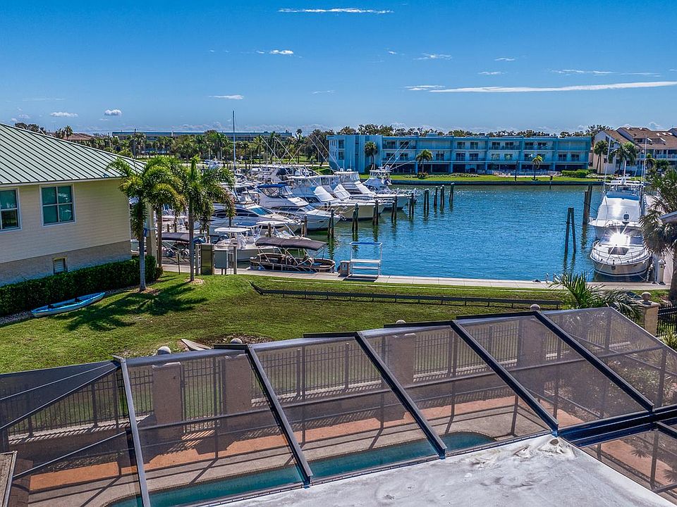 Close proximity to marina with direct gate access behind home.