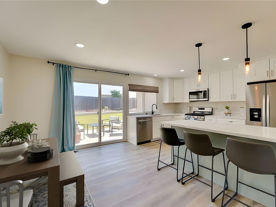 Fully upgraded kitchen with a view to relaxing backyard