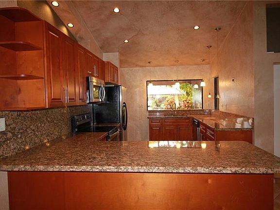 4th image of 7274 Papaya Way