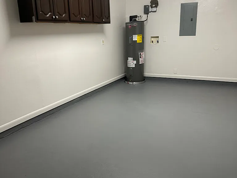 Garage with brand new water heater.