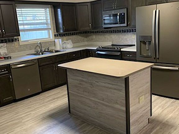 New cabinets and appliances