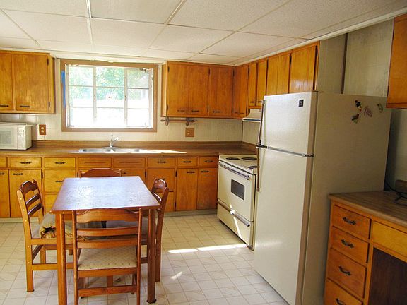 This is the kitchen of the 1st unit with an entry to the kitchen, living room and connected to the office which has it's own entry of course. 