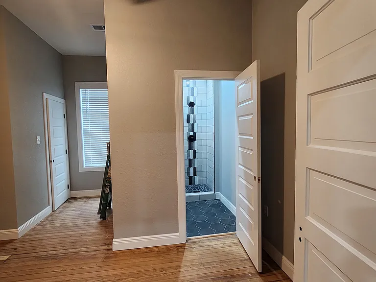Middle Bedroom with Bathroom (3 of 3). Real hardwood flooring