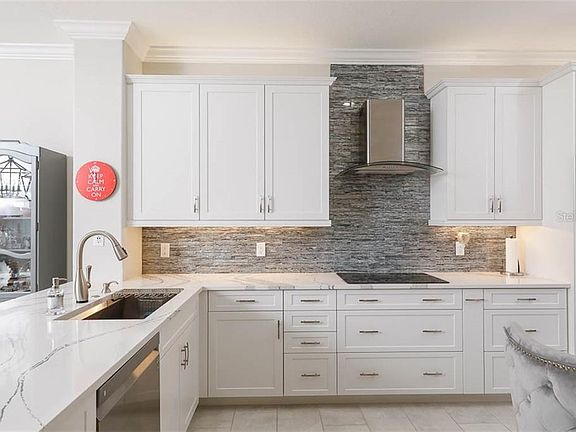 Home For Sale In PELICAN POINTE GOLF COUNTRY CLUB