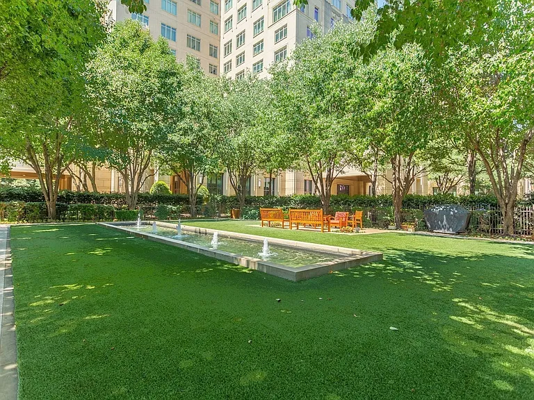 An oasis in the city, the Reflection Fountain Park has moon-lighted trees and a grill.