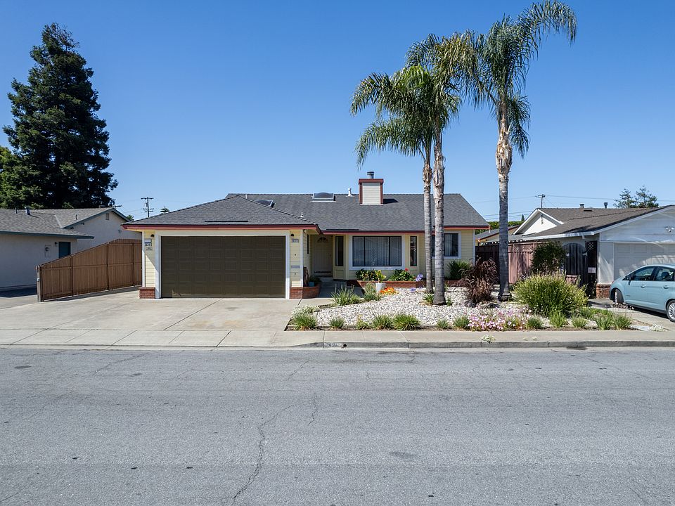 To the left of the Main House is a Driveway to the Rear Property. Private Safe Parking.