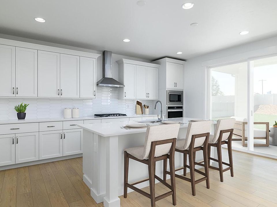 Dream kitchen with large center island and gas cooktop