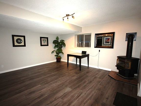 Family Room with cozy gas fireplace
size 16'3 by 15'2