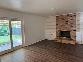 Den - sliding glass doors to backyard deck