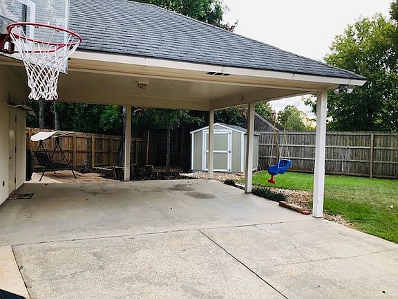 Carport and Backyard