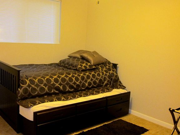 2nd bedroom has twin bed pull out under a twin bed with Tuft and needle mattresses