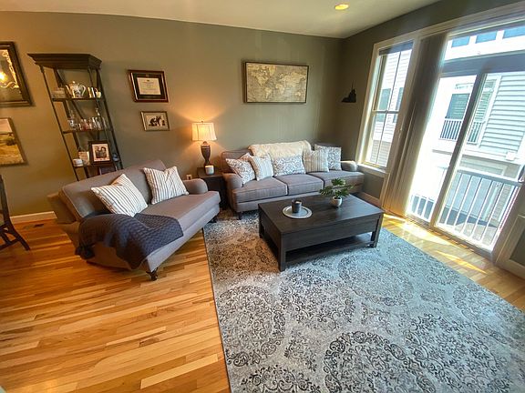Spacious living room with great windows