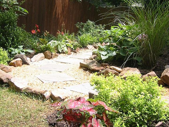 Side yard with flagston path