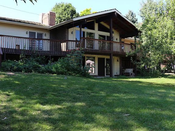 Wraparound deck across entire rear of house